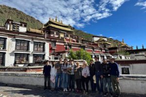 international-tourists-group-at-traditional-tibetan-monastery-tibet