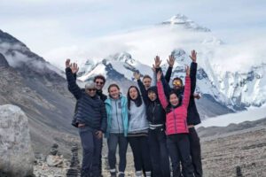 joyful-international-tourists-celebrating-at-mount-everest-base-camp-tibet