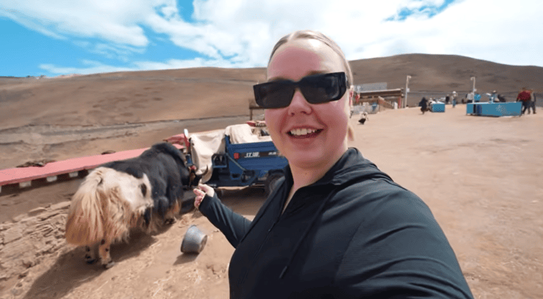 Josie travel YouTuber with yak at Everest Base Camp Tibet women-only tour Experience Tibet